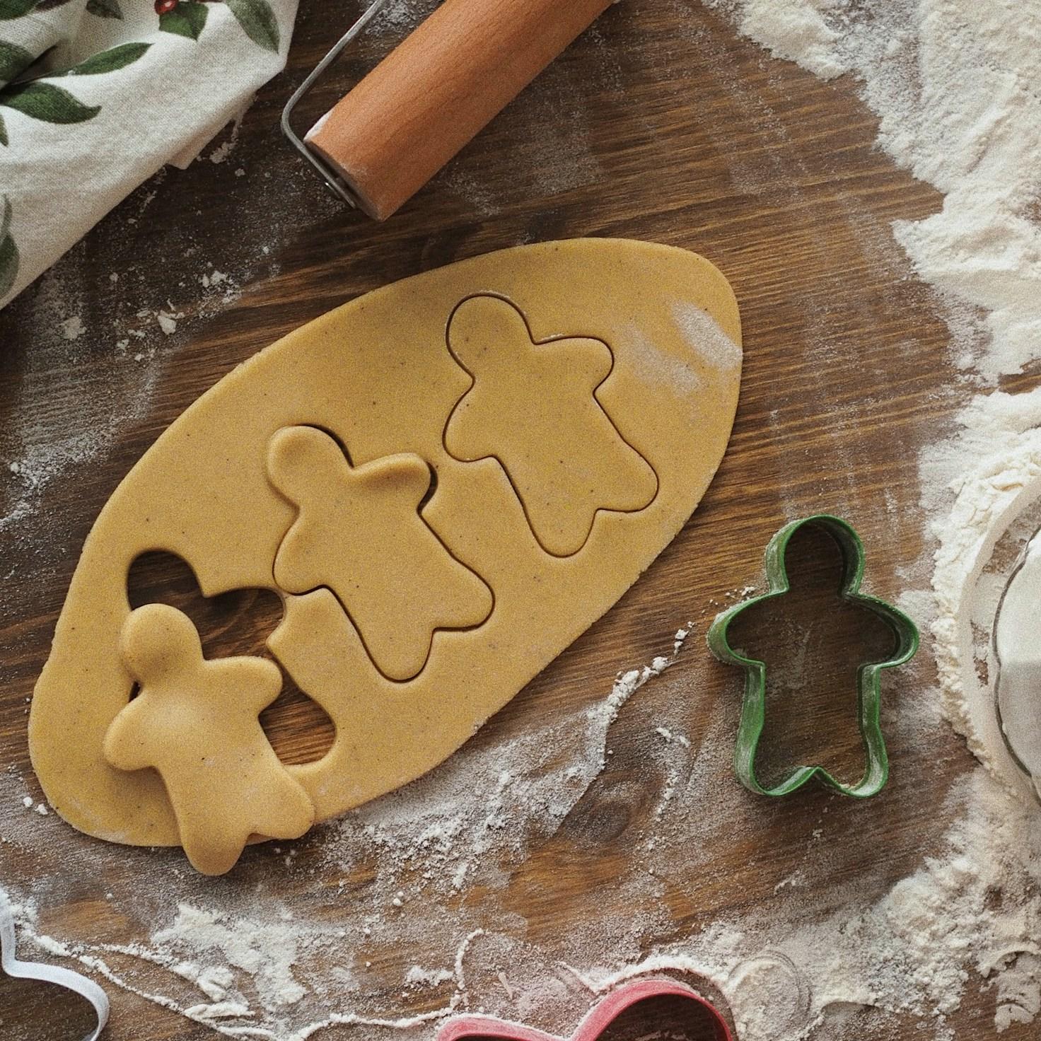 Community members collaborating in a modern kitchen, exchanging recipes and cooking techniques